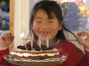 Yanmei has blown out all the candles on her birthday cake
