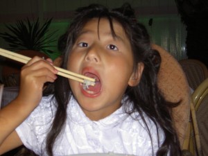 Yanmei and chopsticks - Mallorca on her birthday