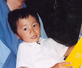 relaxing after his Christening - June 2003