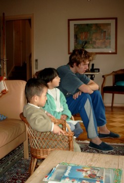 Daji, Yanmei and Thomas watching Sunday morning childrens TV