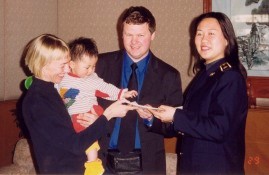 The offical presentation of the adoption documents to Gunhild and Jens