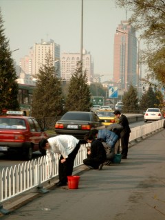 Street washing - by hand - just outside our hotel