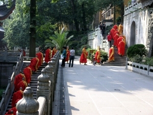 Monks leaving one of the halls in procession after prayer