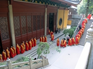 Monks leaving one of the halls in procession after prayer
