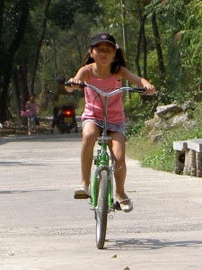 Yanmei practicing on her bike