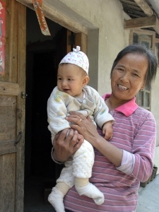 Cycle shop owners wife and grandchild