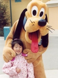 Yanmei with Pluto, Disney, Paris, March 2004